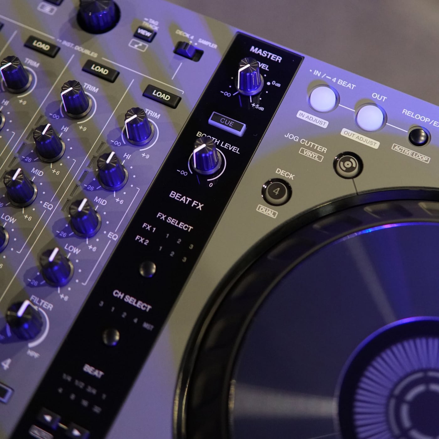 Extreme close-up of a silver control knob on professional audio equipment