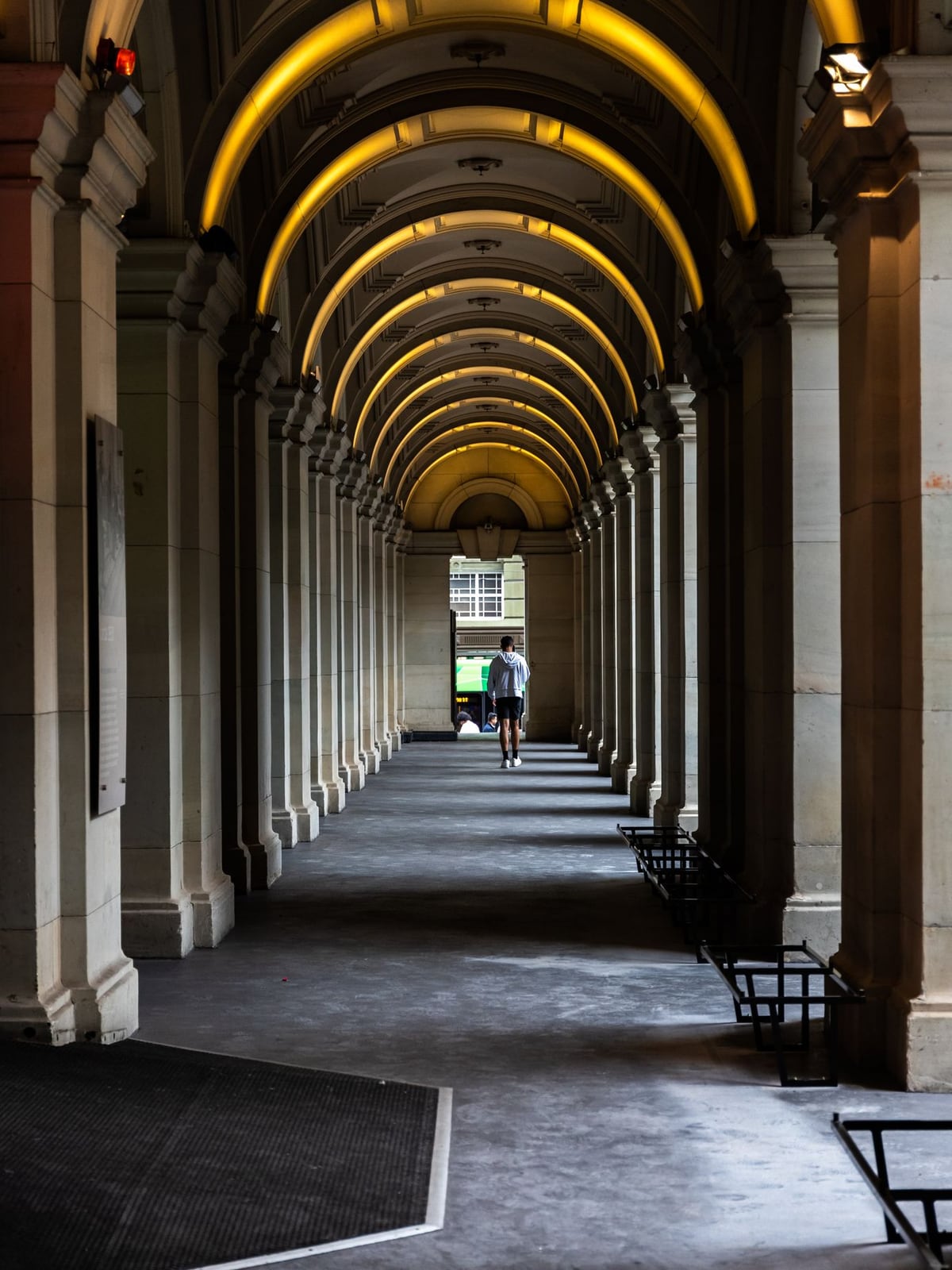 The modern exterior entrance of the studio building on Collins Street